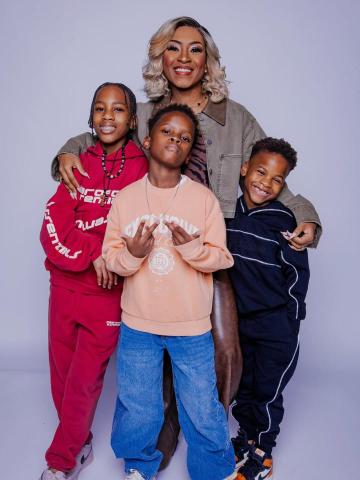 May be an image of child, makeup, smiling, sweatsuit and text