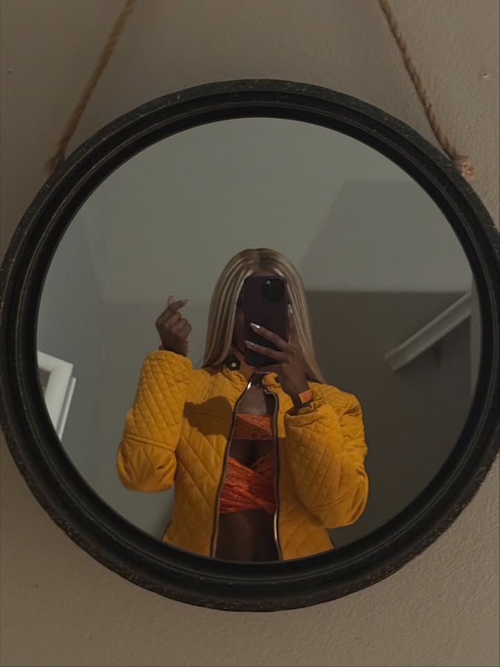 May be a selfie of mirror and bottle