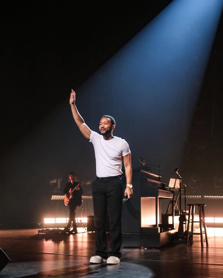 May be an image of microphone, concert and text