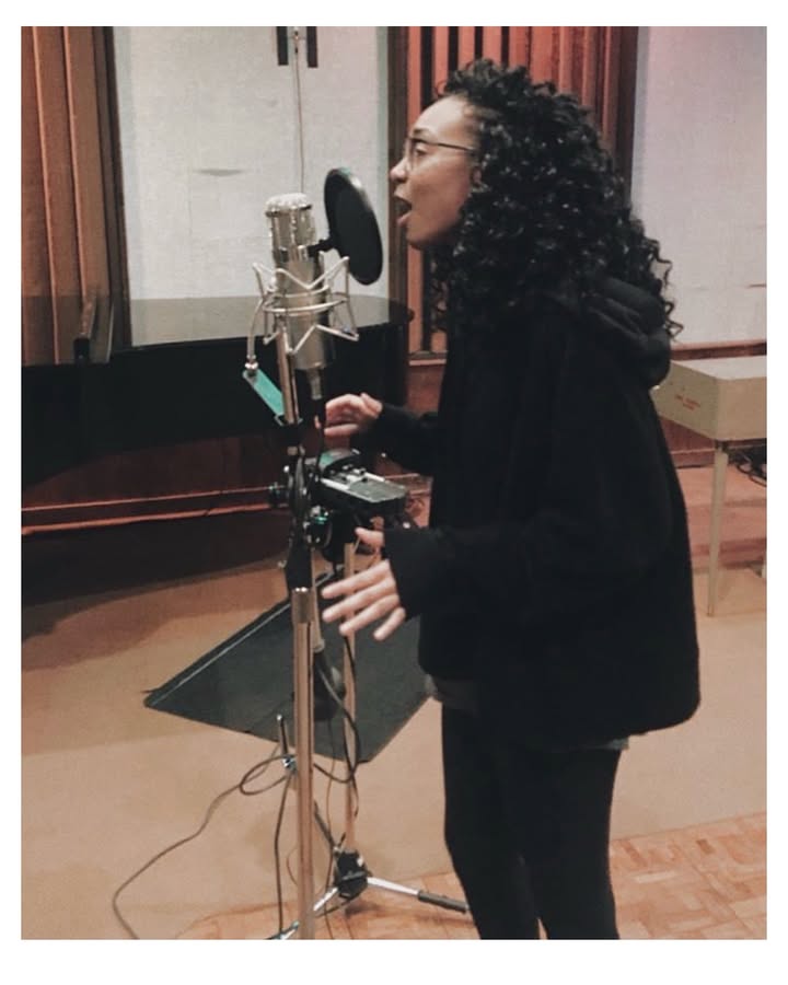 May be an image of microphone, tambourine and text