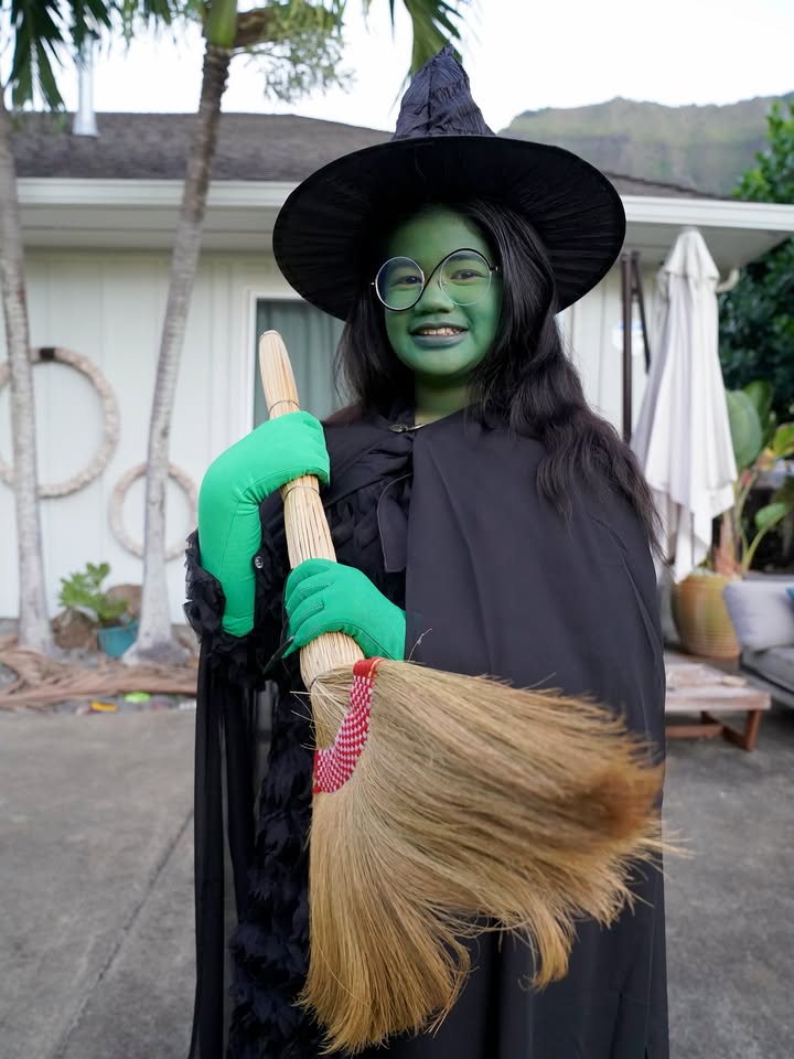 May be an image of costume, scarecrow and cloak