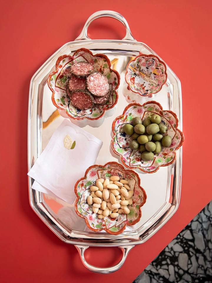 May be an image of napkin ring, platter, kitchenware and text