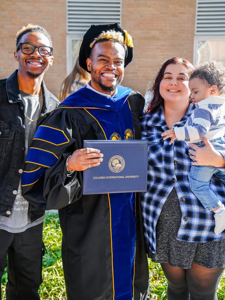 May be an image of smiling, standing and text