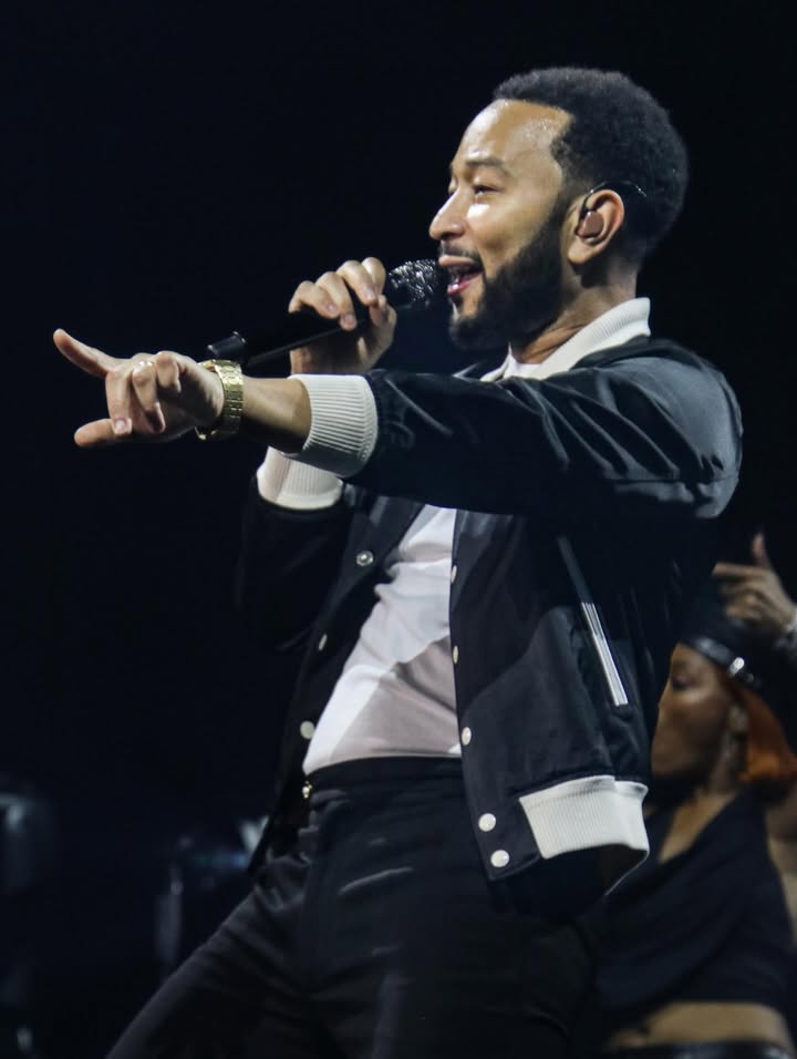 May be an image of microphone, concert and text