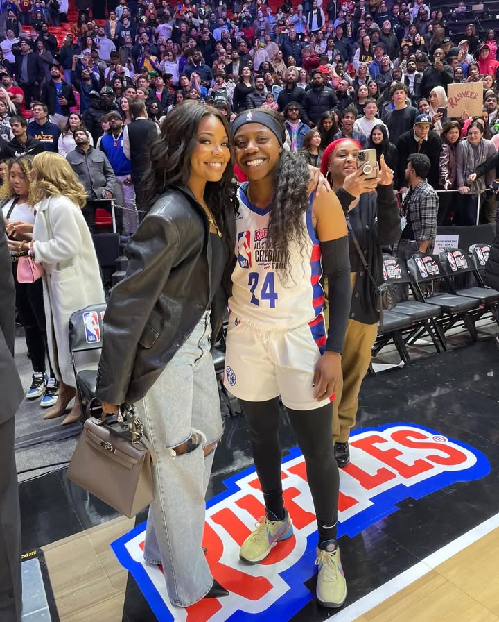 May be an image of basketball, sportswear and text