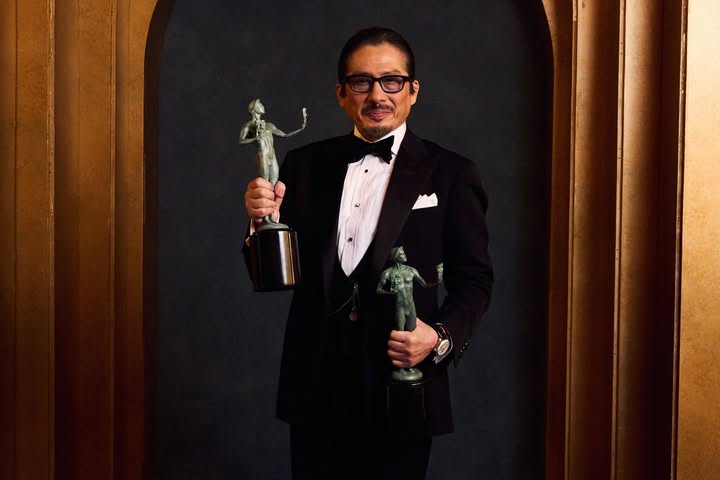 May be an image of one or more people, dinner jacket and text