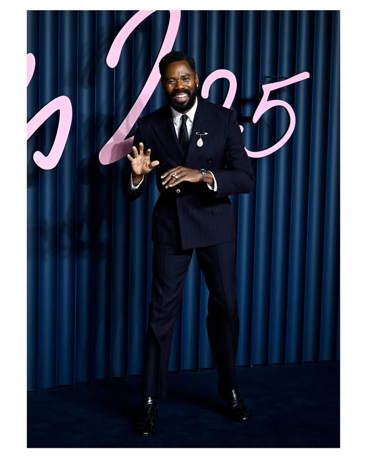 May be an image of one or more people, suit, dinner jacket, magazine, blazer and text