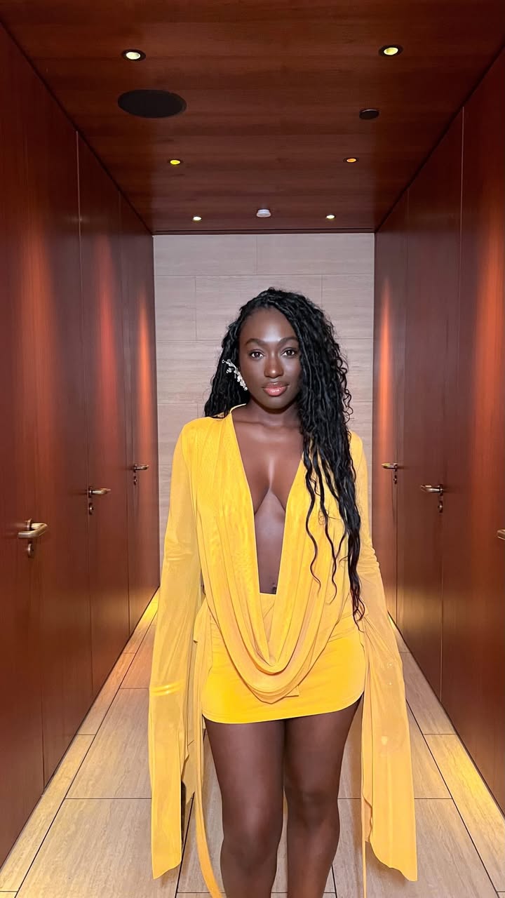 May be an image of one or more people, sundress, dress and text