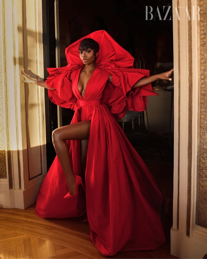 May be an image of one or more people, makeup, gown, dress and text