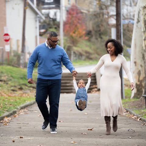 May be an image of baby, standing, park and text