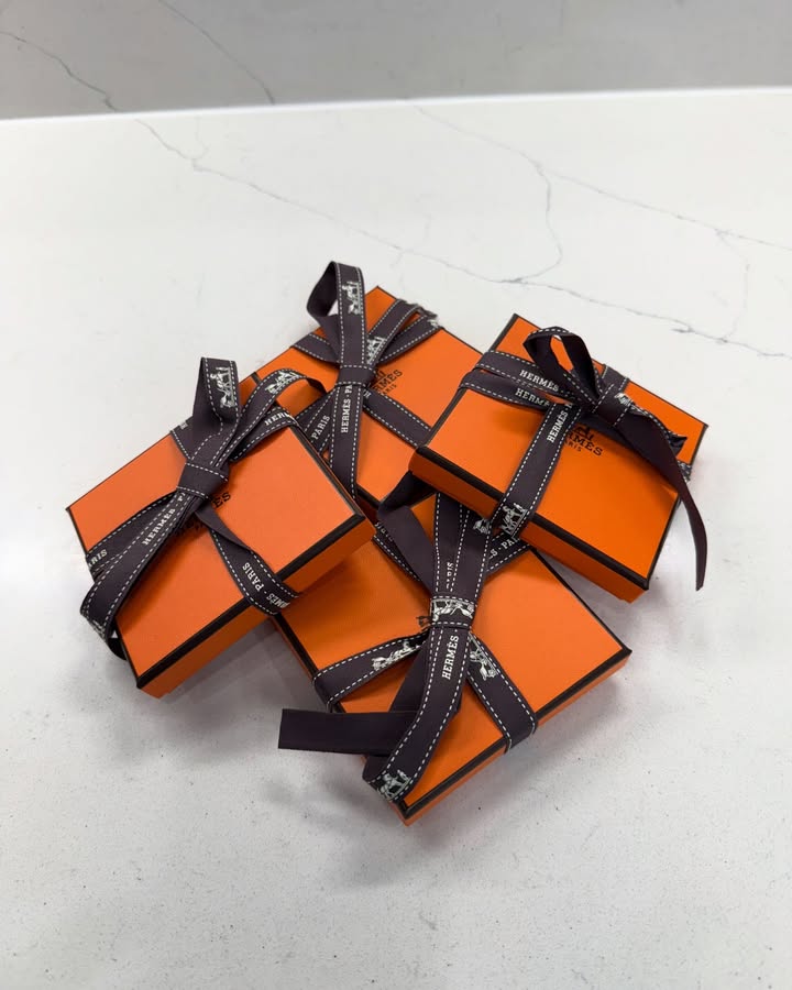 May be an image of napkin ring, box, hamper, carton and text