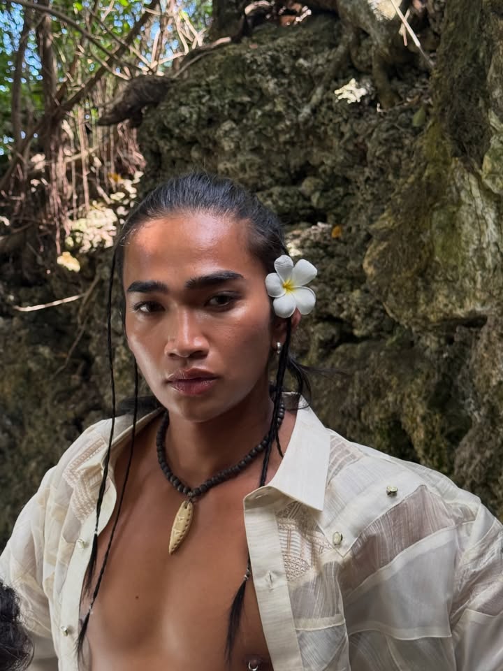 May be an image of barong, sarong and text