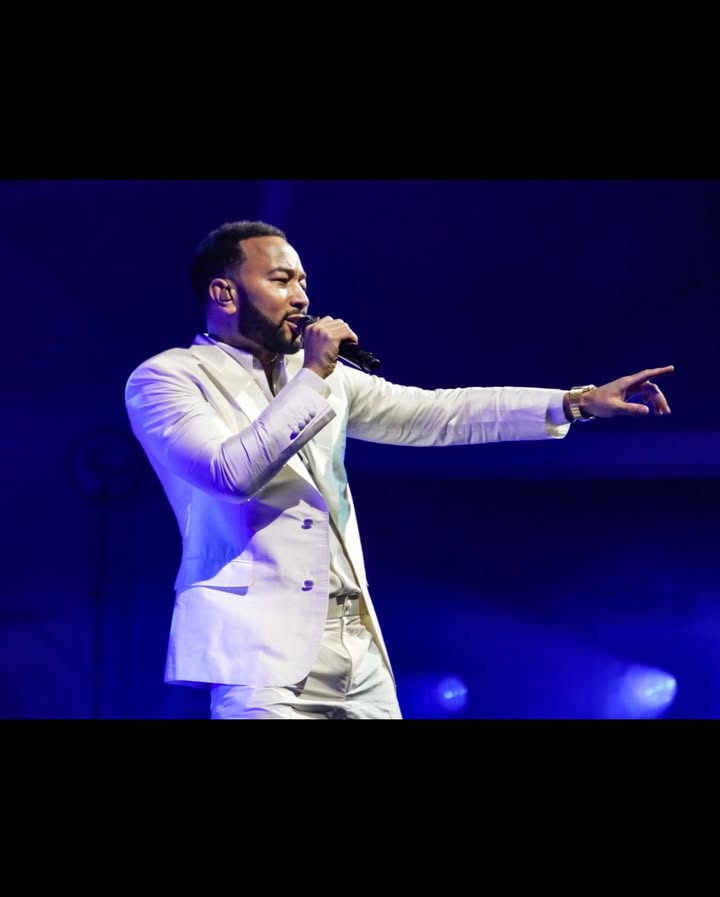 May be an image of microphone, blazer, concert and text