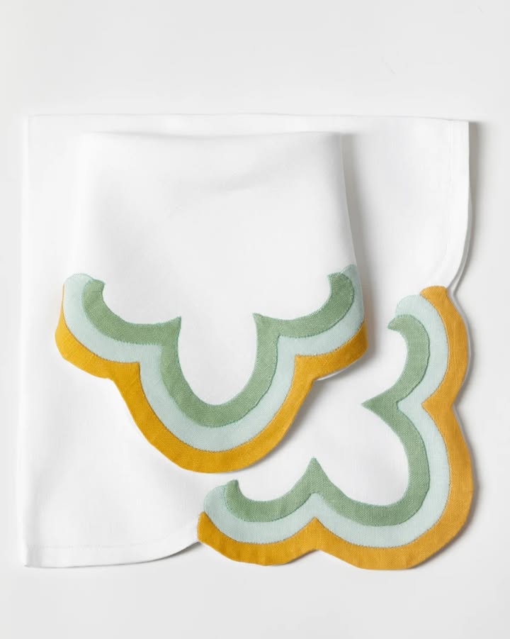 May be an image of towel rack, tablecloth, napkin, placemat, bathmat and text