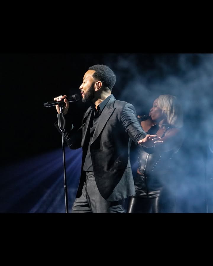 May be an image of microphone, concert and text