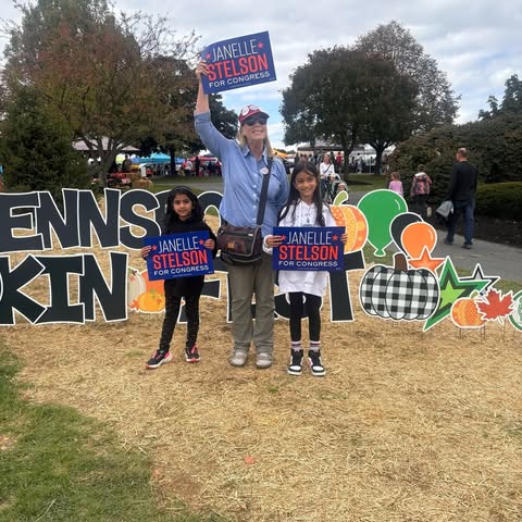 May be an image of banner, scarecrow, pumpkin and gourd