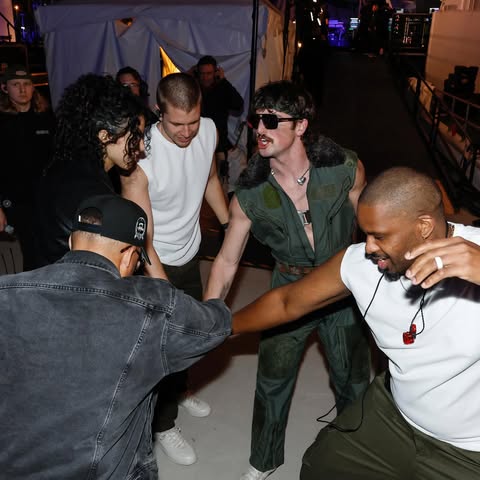 May be an image of one or more people, people dancing, crowd and text