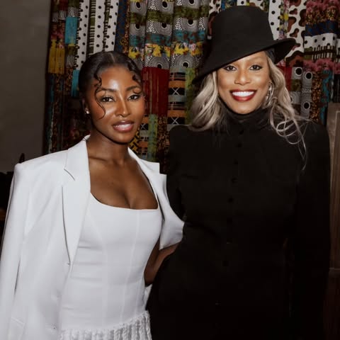 May be an image of one or more people, makeup, headscarf and text