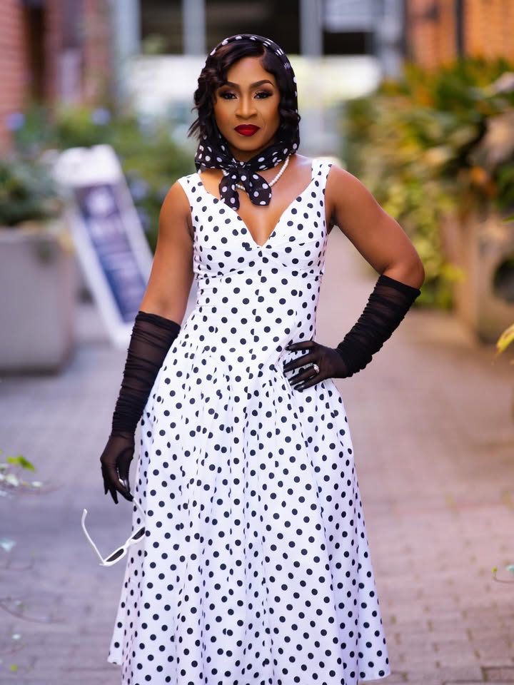 May be an image of one or more people, makeup, gown, headscarf, dress and text