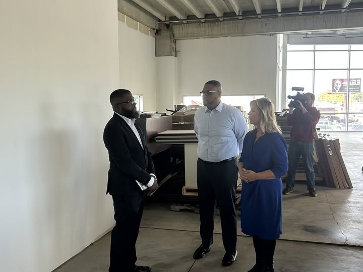 May be an image of standing and office