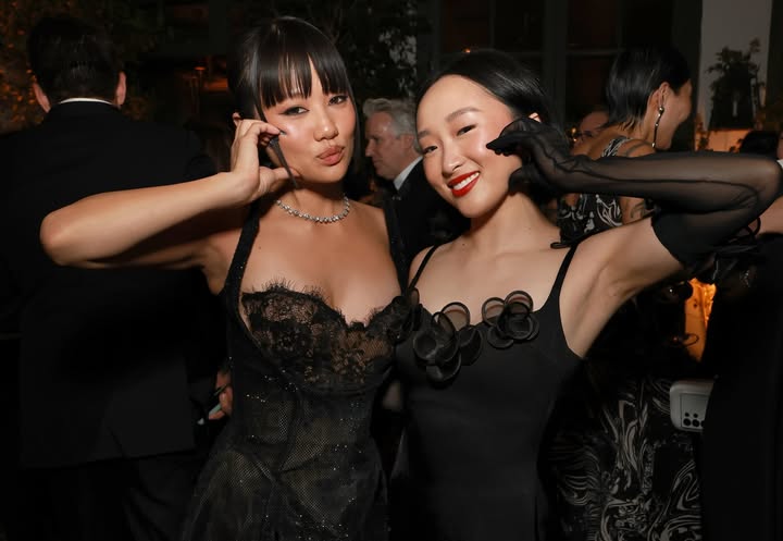 May be an image of one or more people and text