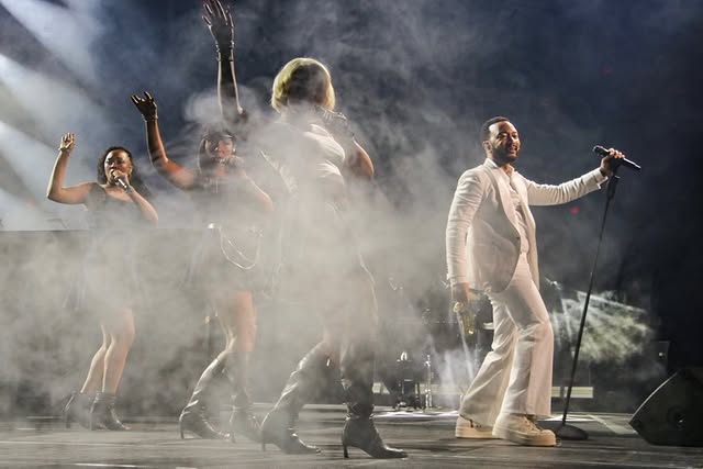 May be an image of dancing, concert and text