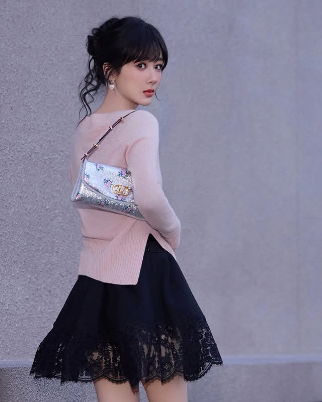 May be an image of miniskirt, purse and text