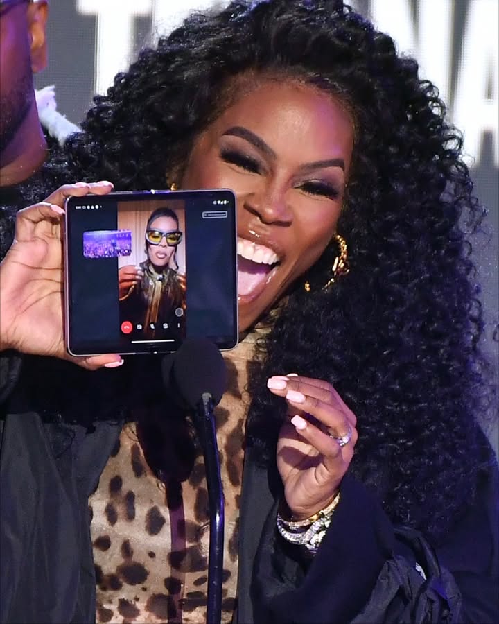 May be an image of one or more people, makeup, microphone, magazine and text