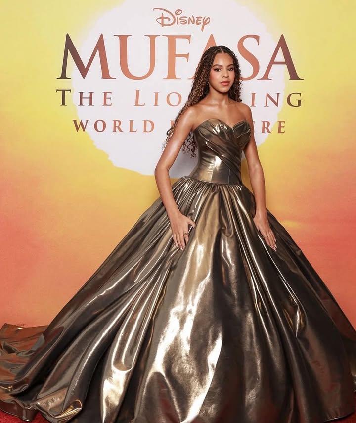 May be an image of gown, dress and text that says 'Disney MUFOS SA TH ELIOALING ING LIO WORLD RE R RE'