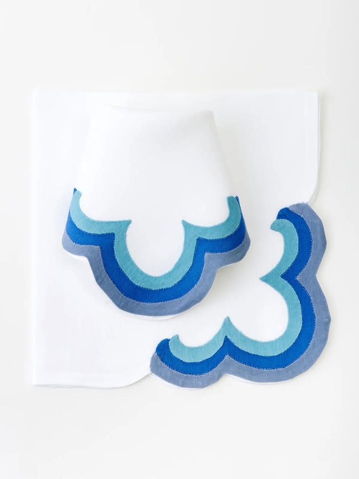 May be an image of napkin ring, tablecloth, placemat, napkin and text