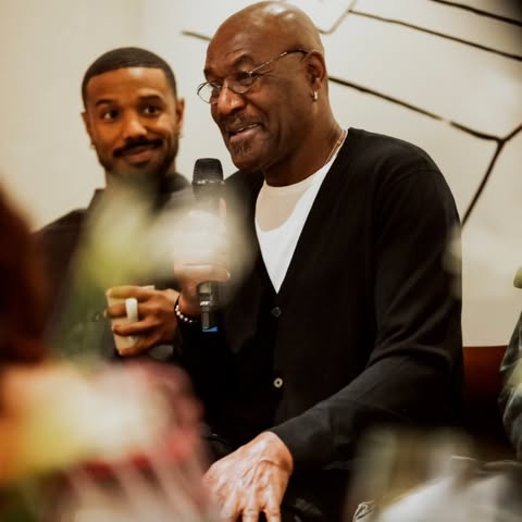 May be an image of one or more people and text