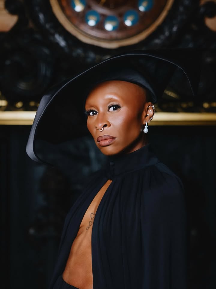 May be an image of one or more people, makeup, hat, beret, bowler hat, headscarf and text