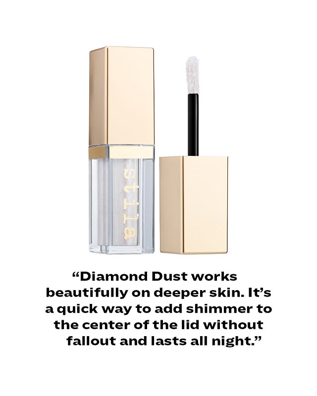 May be an image of one or more people, makeup, lipstick, cosmetics and text that says 'T の အ "Diamond Dust works beautifully on deeper skin. It's a quick way to add shimmer to the center of the lid without fallout and lasts all night."'