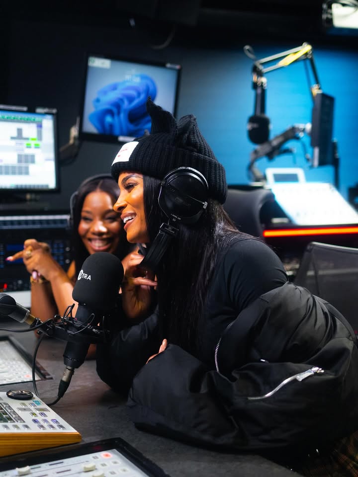 May be an image of microphone and text