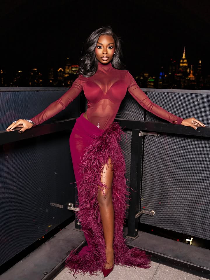 May be an image of one or more people, gown, dress and text