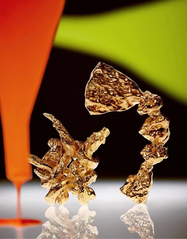 May be an image of jewelry and text