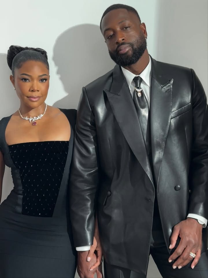 May be an image of blazer, gown, dinner jacket and dress