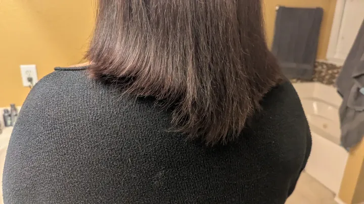 May be an image of one or more people, long hair and text