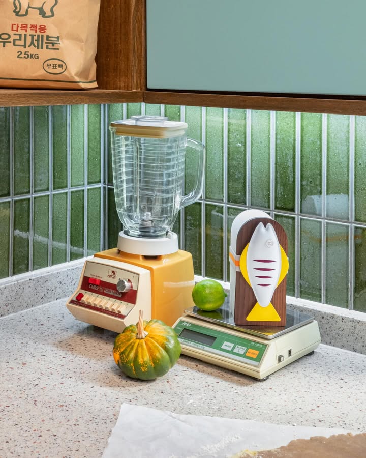 May be an image of lamp shade, lamp, microwave and carafe