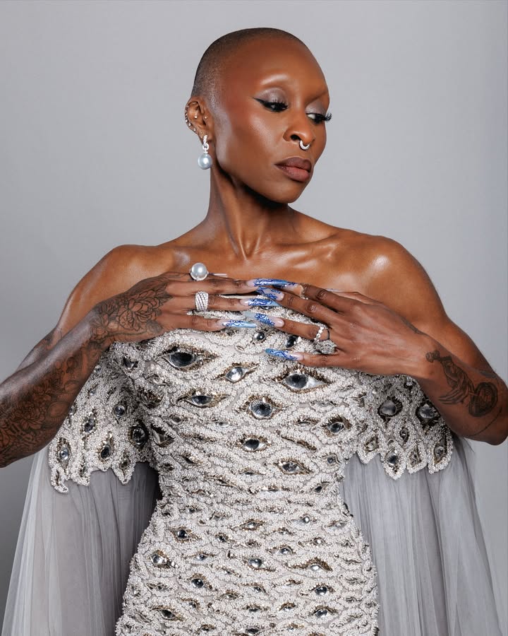 May be an image of one or more people, makeup, dress and gown