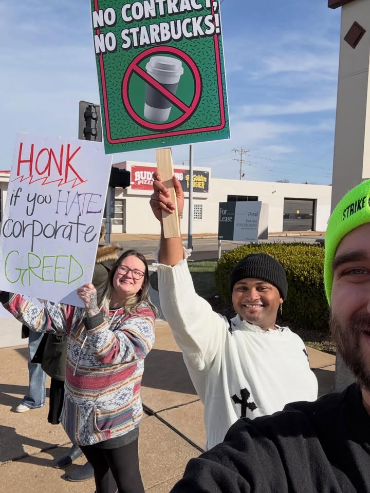 May be an image of standing, banner and text