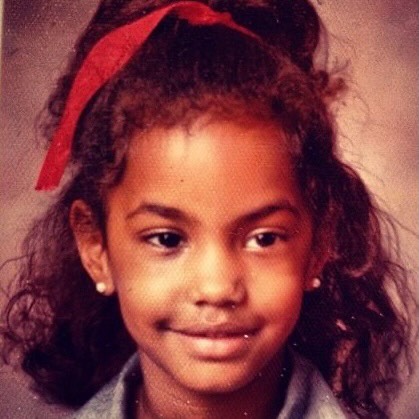 May be an image of one or more people, bangs, barrette and text