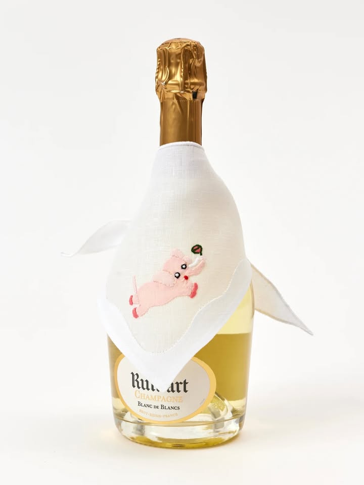 May be an image of champagne, wine bottle, bottle and text