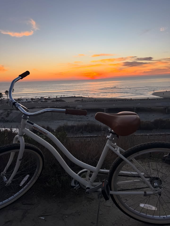 May be an image of bicycle, coast and text