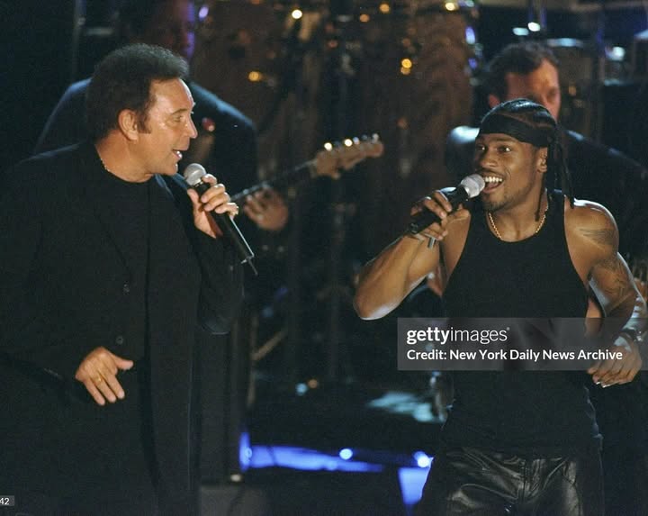 May be an image of microphone and concert