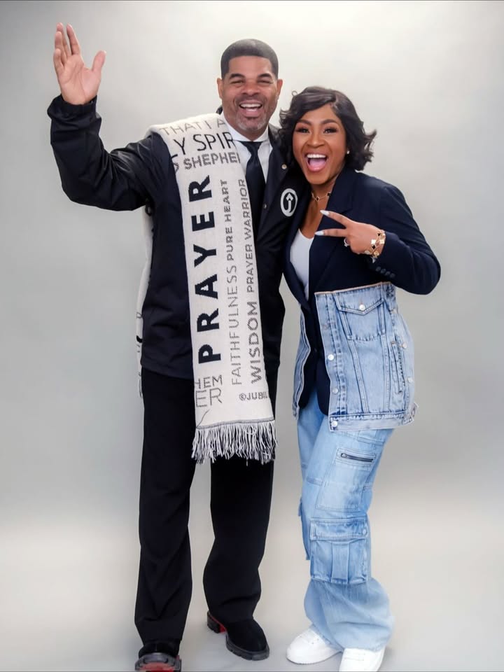 May be an image of one or more people, people standing, shawl and blazer