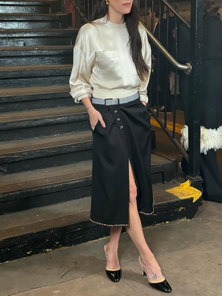 May be an image of slingback shoes, skirt and text