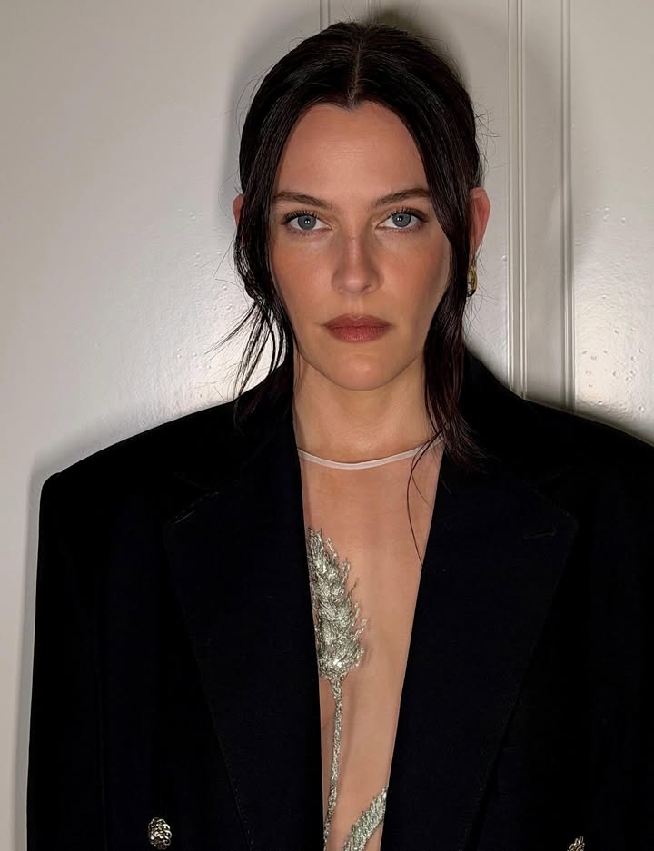 May be an image of one or more people, makeup, jewelry, bolo tie and text