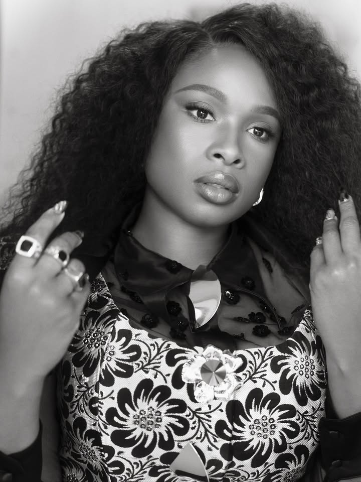 May be a black-and-white image of one or more people, makeup and hair