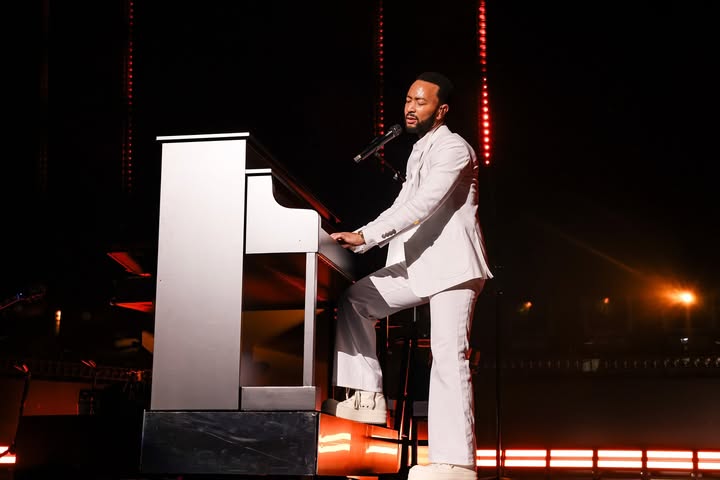 May be an image of piano, microphone, concert and text